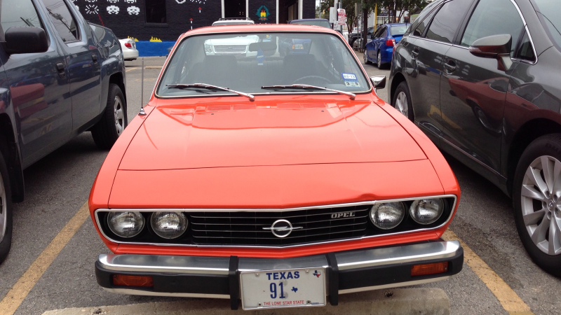 Illustration for article titled This Opel Manta Is A Bolt Of Orange Lightning